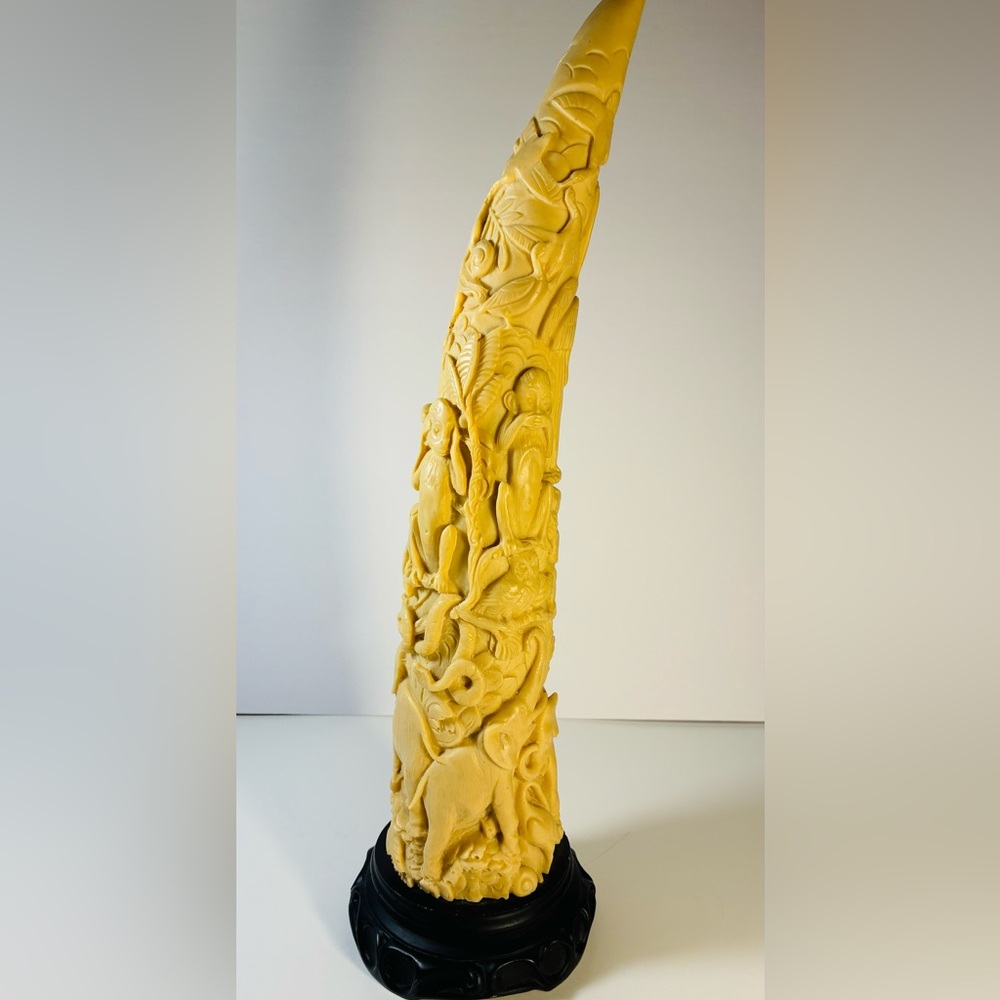 Intricately Carved Resin Tusk sculpture 17”